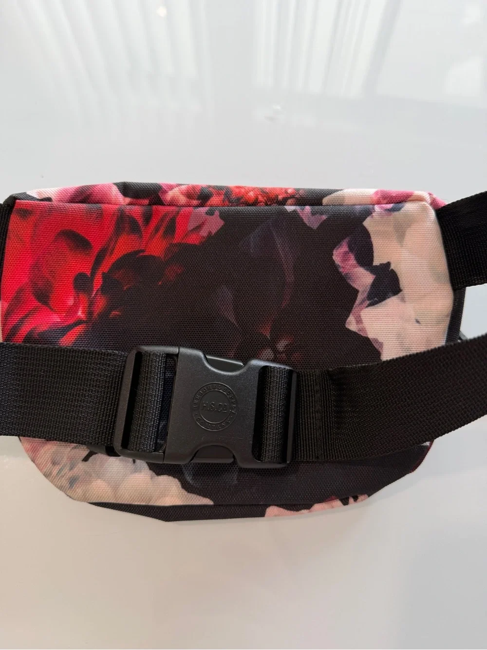 Herschel Supply Company Black Crossbody Sling with Pink Floral Print